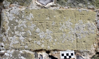 Examples of initials on west side of the porch.