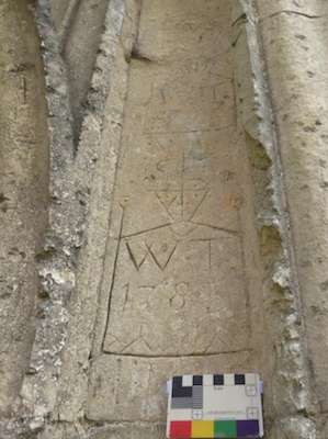 South side of doorway. Elaborate boxed initials WT 1783