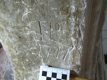 South doorway: dated 1711 with TP