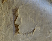 A face, in profile, in the Stables of Holy Cross, Winchester