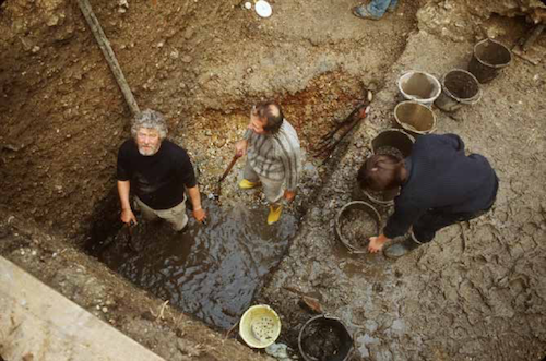 Plumbing  the depths of the inner moat at Odiham Castle, 1984